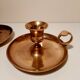 Pair of brass hand candlesticks