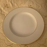 White porcelain dinner plates with a golden thread