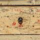 Antique Chinese apothecary cabinet with calligraphy