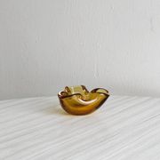Thick amber yellow glass ashtray