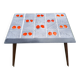 Small 1960s enamelled table, spindle legs, signed jd.