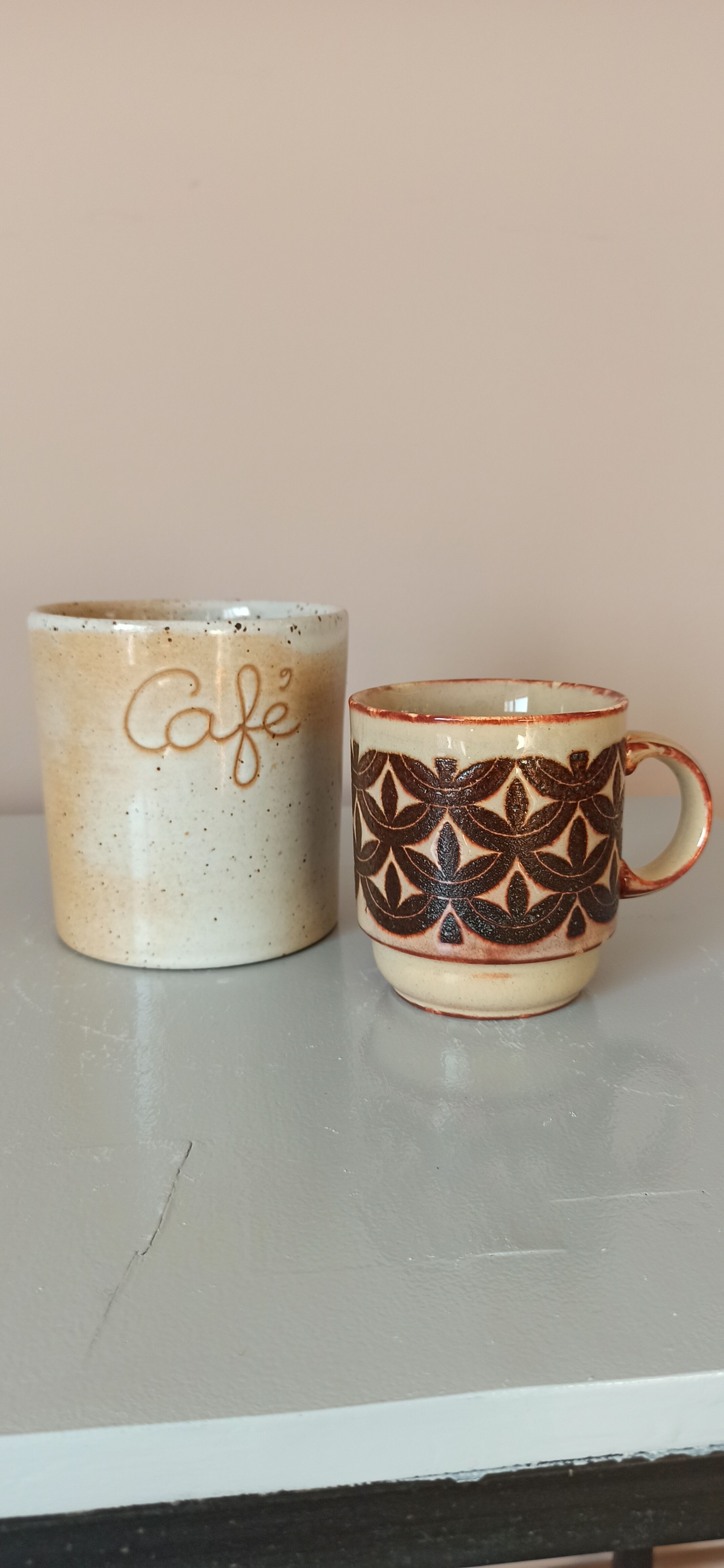 Coffee pot and mug cup in sandstone