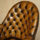 Fauteuil Chesterfield directeur ou capitaine Art Déco en cuir restauré