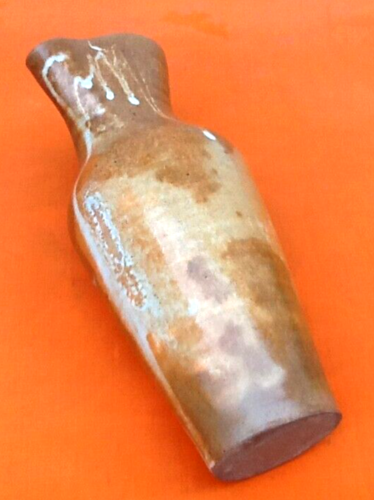Glazed stoneware pitcher With white dripping on brown background Height: 270mm