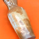 Glazed stoneware pitcher With white dripping on brown background Height: 270mm