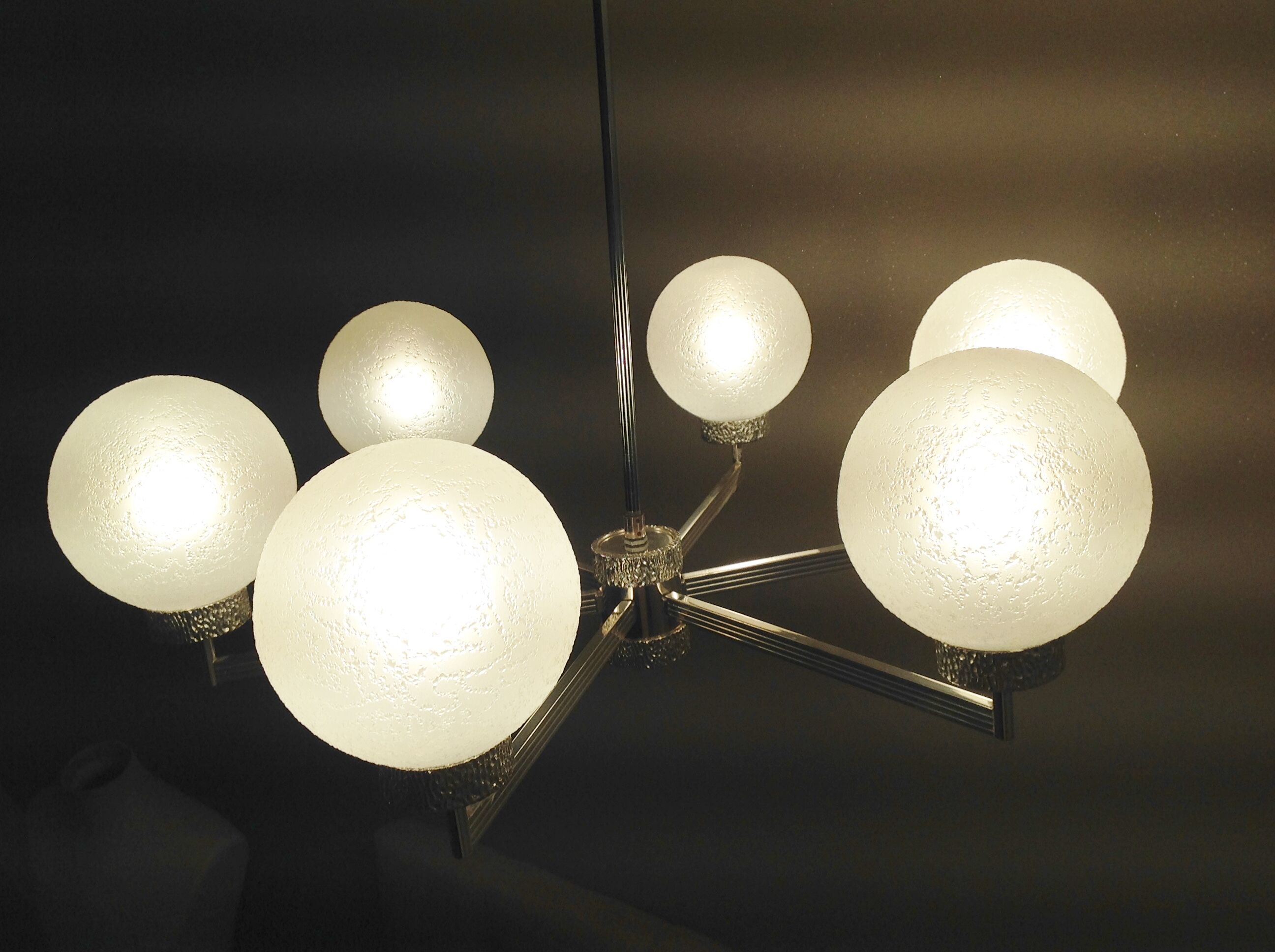 Six-light chrome metal chandelier and opaque glass globes / vintage 60s and 70s