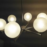 Six-light chrome metal chandelier and opaque glass globes / vintage 60s and 70s