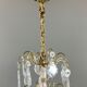 Bronze and crystal chandelier with pendants, Louis XV style, 20th century.