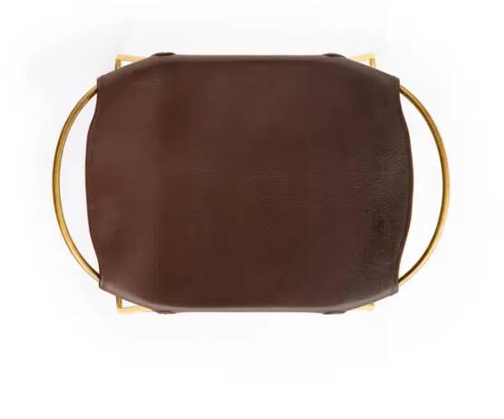 Brown stool pair without backrest with brass details.