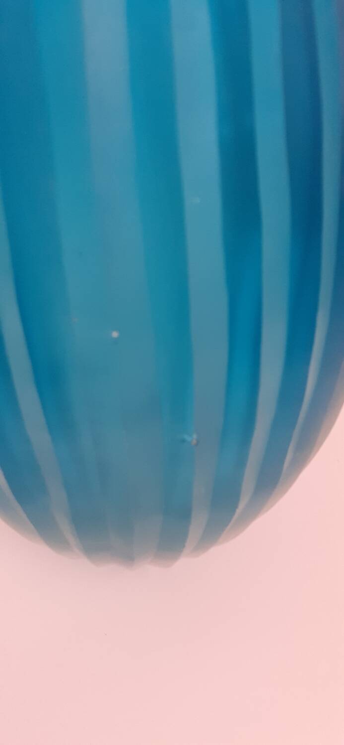 Antique turquoise glass vase