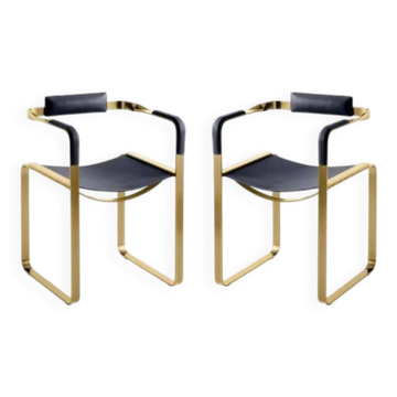 Pair of Wanderlust armchairs with navy blue backrest and brass.
