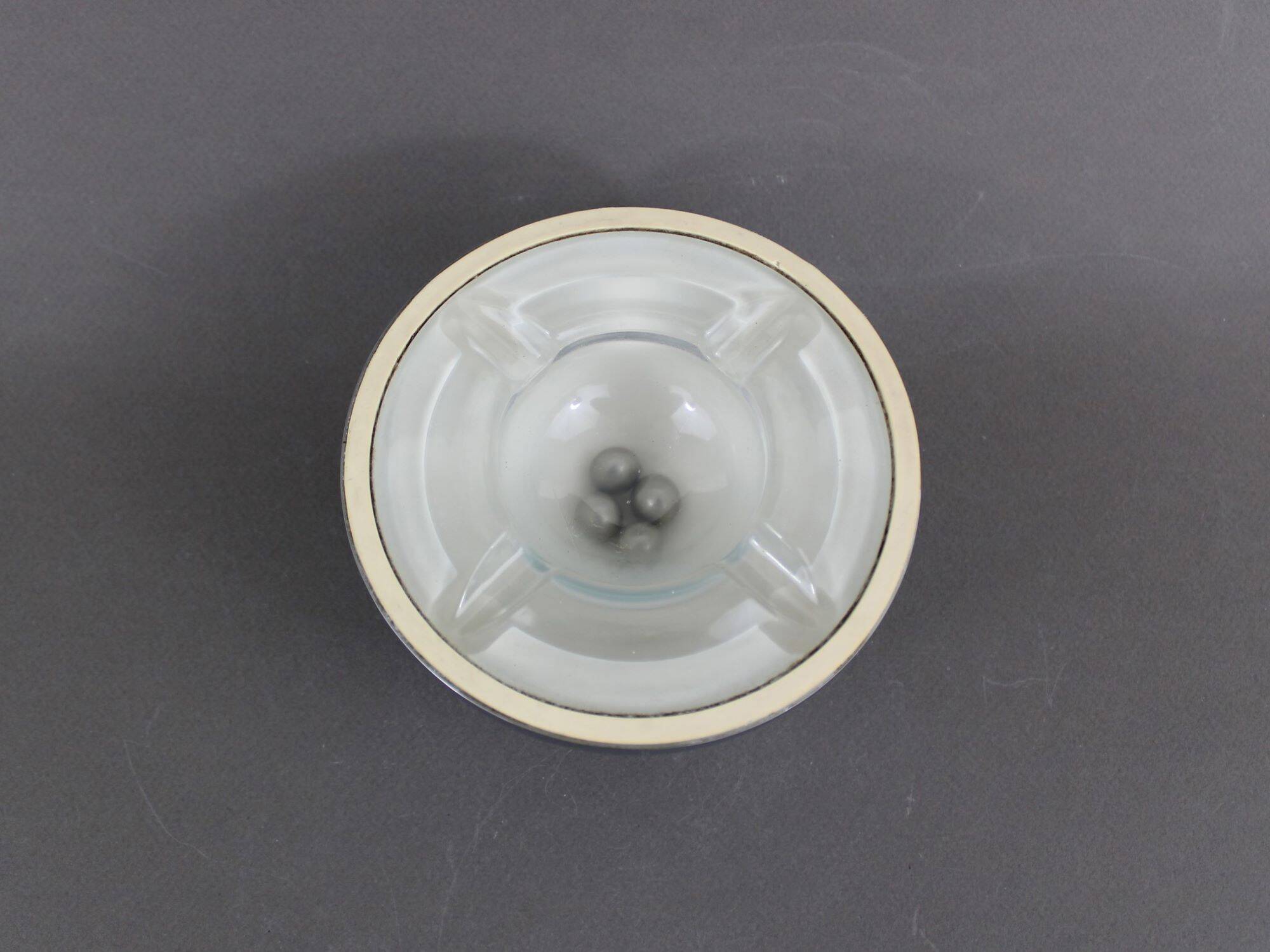Puzzle ball ashtray design in vintage metal from the 70s