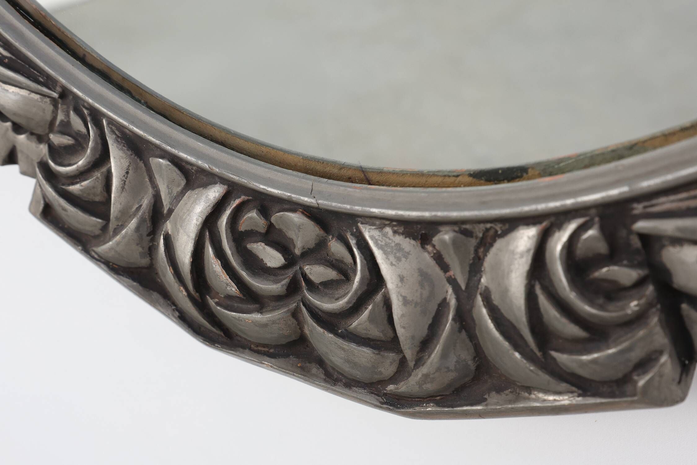 French Art Deco Oval Mirror with Carved Roses and Silver-Painted Frame