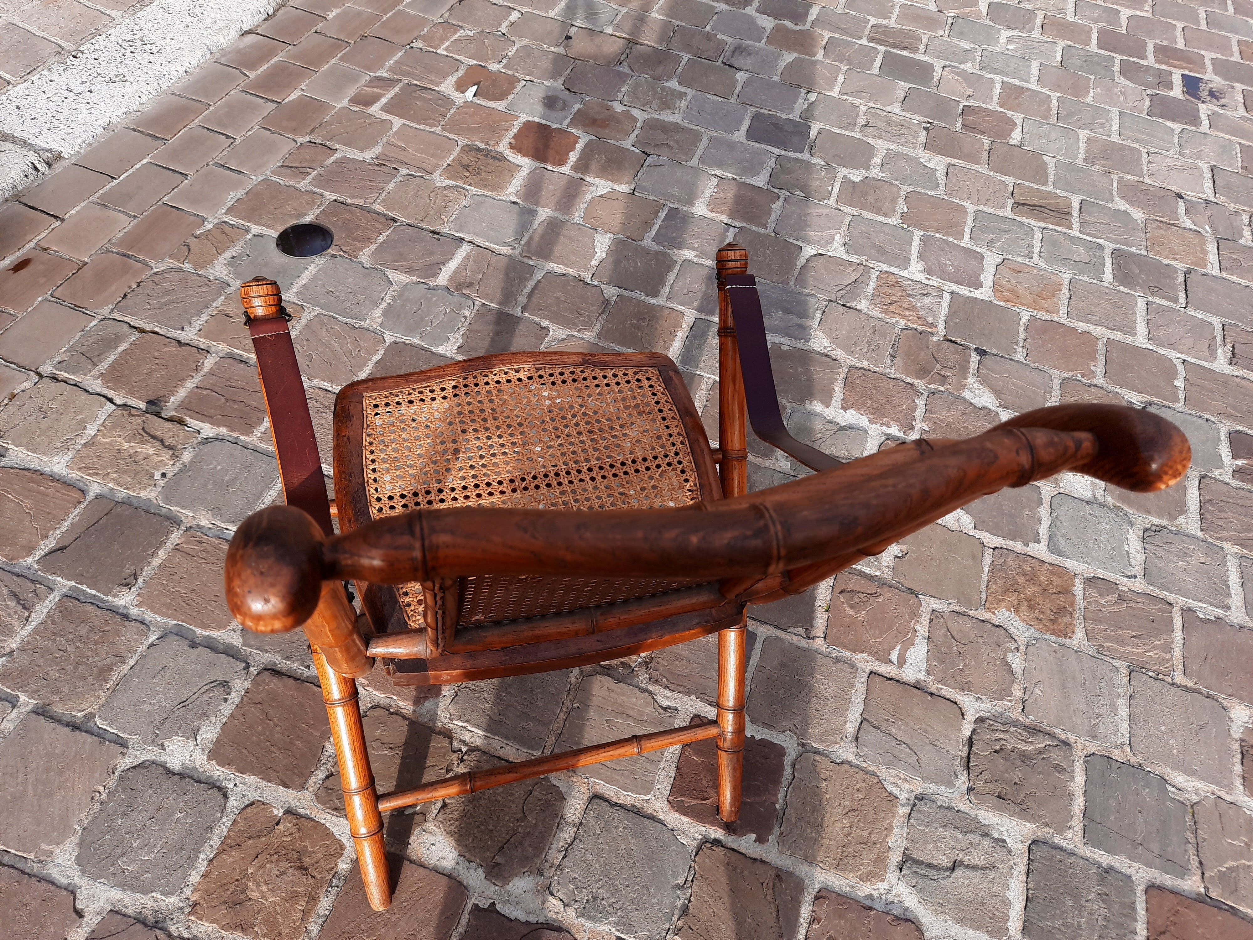 Bamboo folding chair and caning, leather and brass