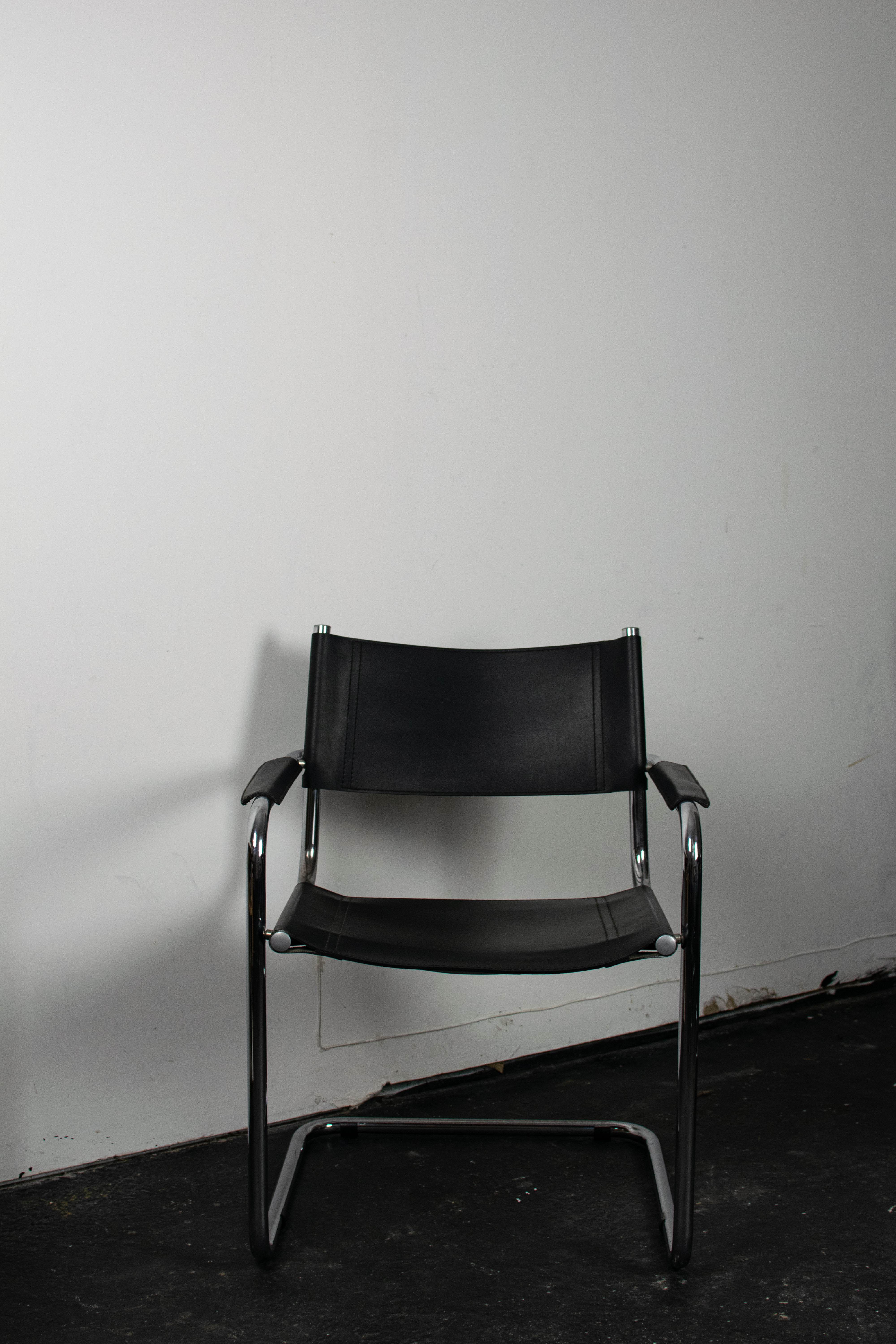 Black leather cantilever armchair 70s-80s