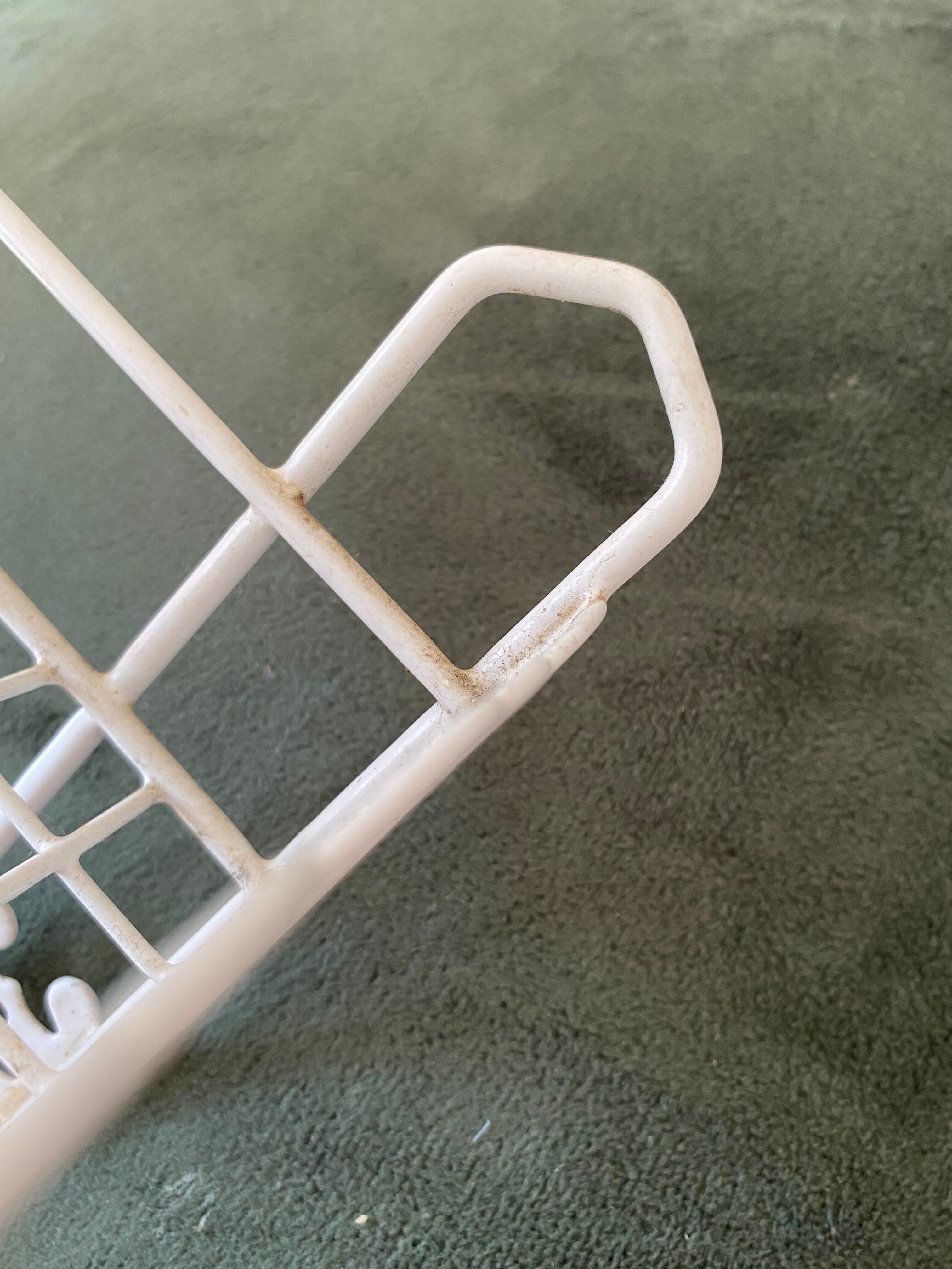 Openwork metal shelf