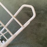 Openwork metal shelf