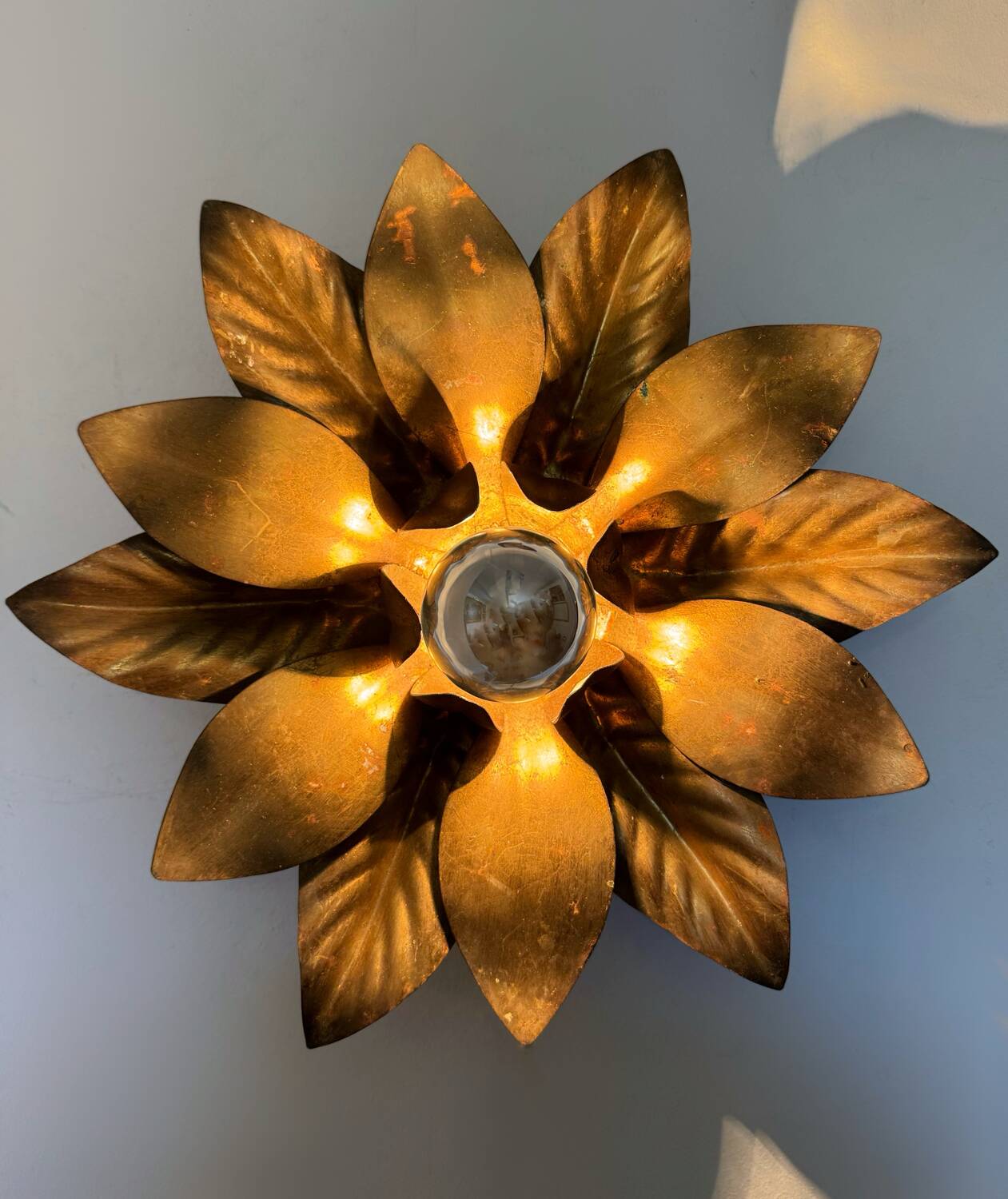 Golden flower wall light from the 70s