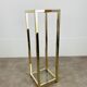 Gilded metal fifth wheel column and Hollywood Regency style glass 70s