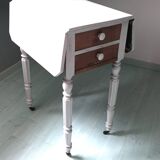 Table with drop-leaf parts