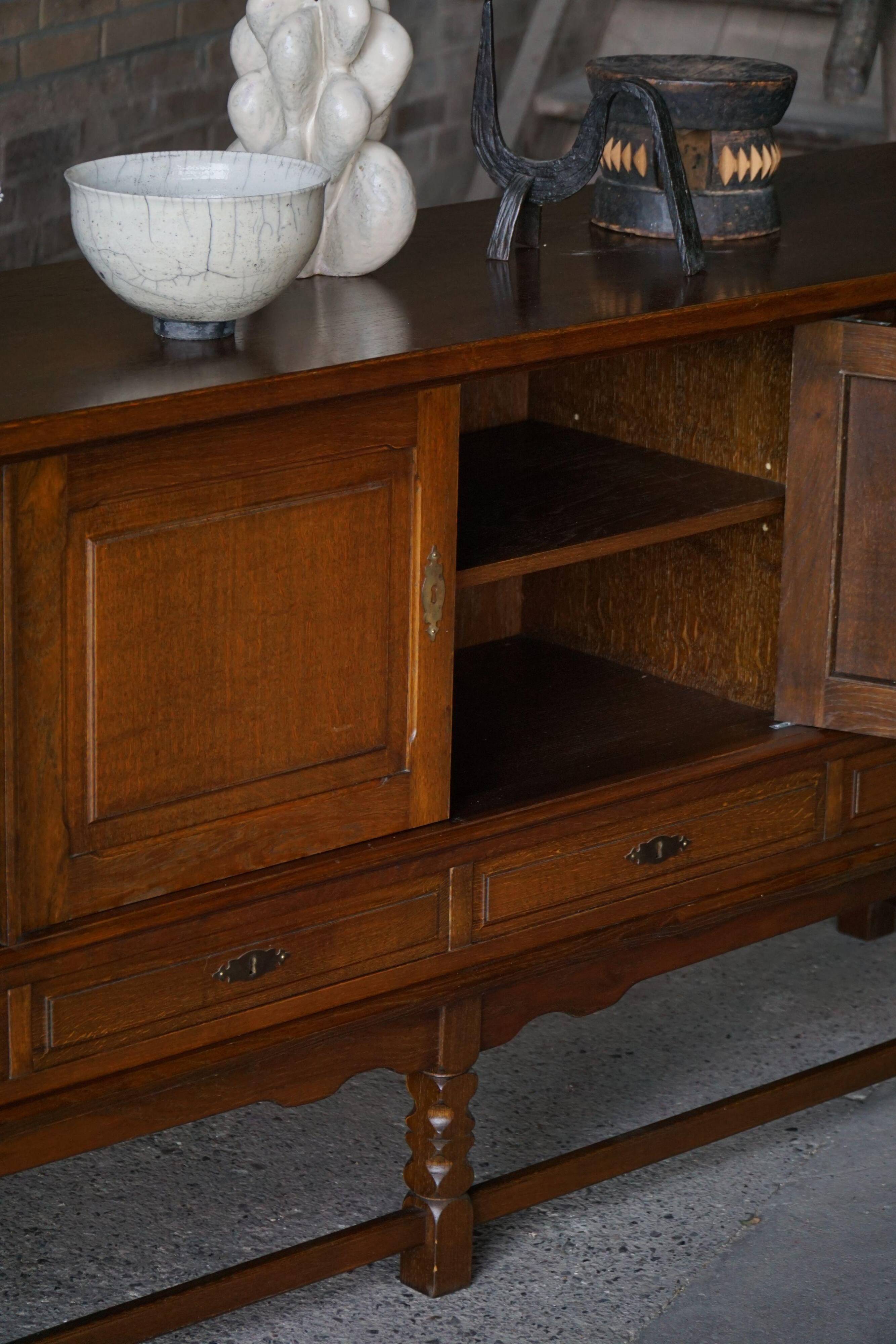 Danish enfilade from the mid-modern century in dark stained oak, 1960s.