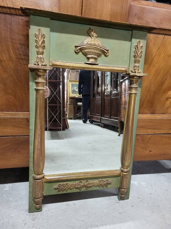 Empire style mirror in wood and gilding