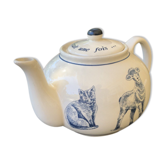 White porcelain teapot decorated with animals