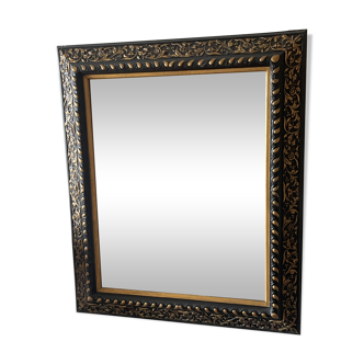Antique mirror from the early 20th century, black and gold