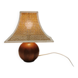 Very rare table lamp in turned teak wood with original braided shade. 1970s