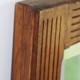 Beveled mirror grooved wood