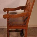 high-backed armchair from the 17th century in oak