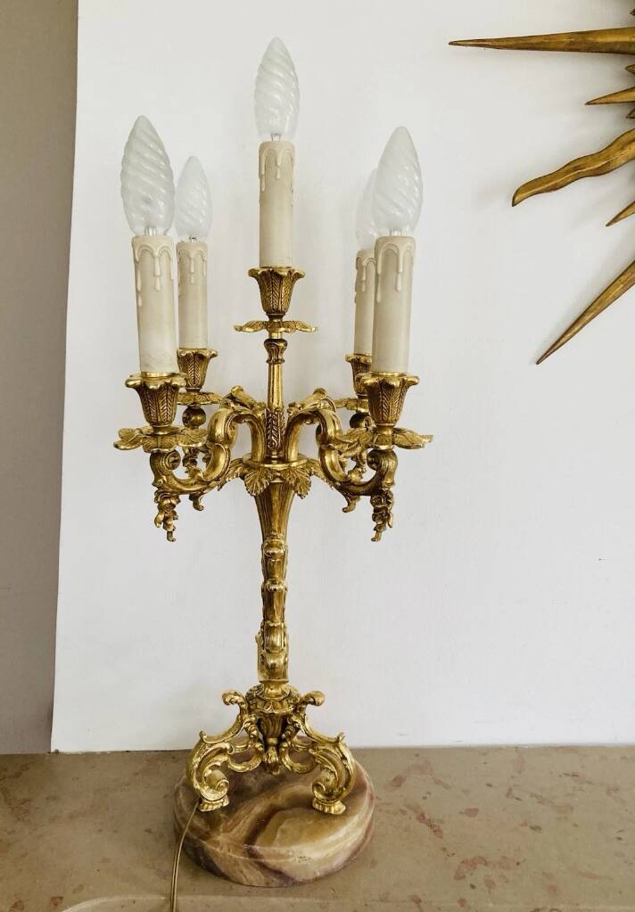 Pair of gilt bronze chandeliers, marble bases.