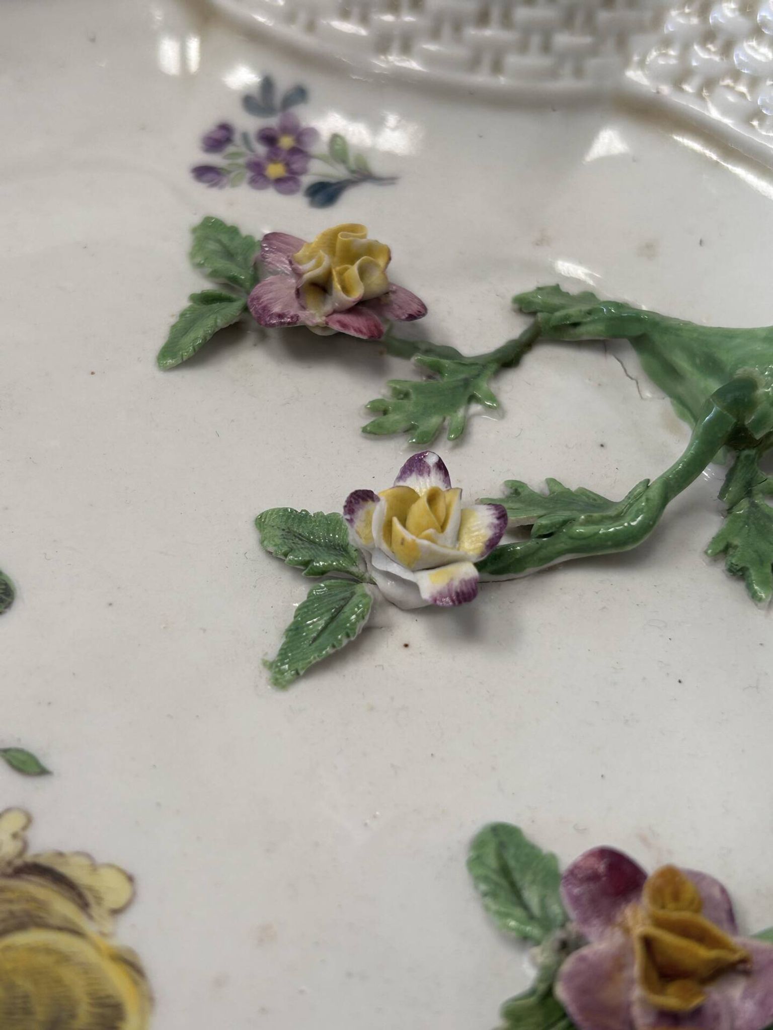 Large decorative antique plate with raised flowers – 19th century style