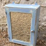 Small blue vintage pharmacy cabinet