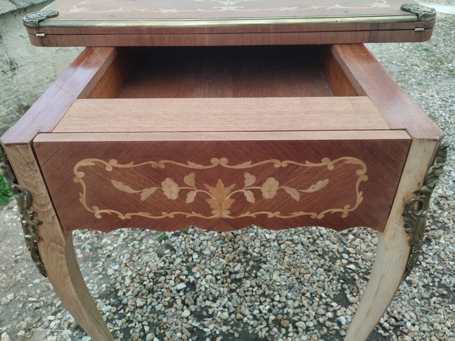 Antique game table in Louis XVI style with marquetry.