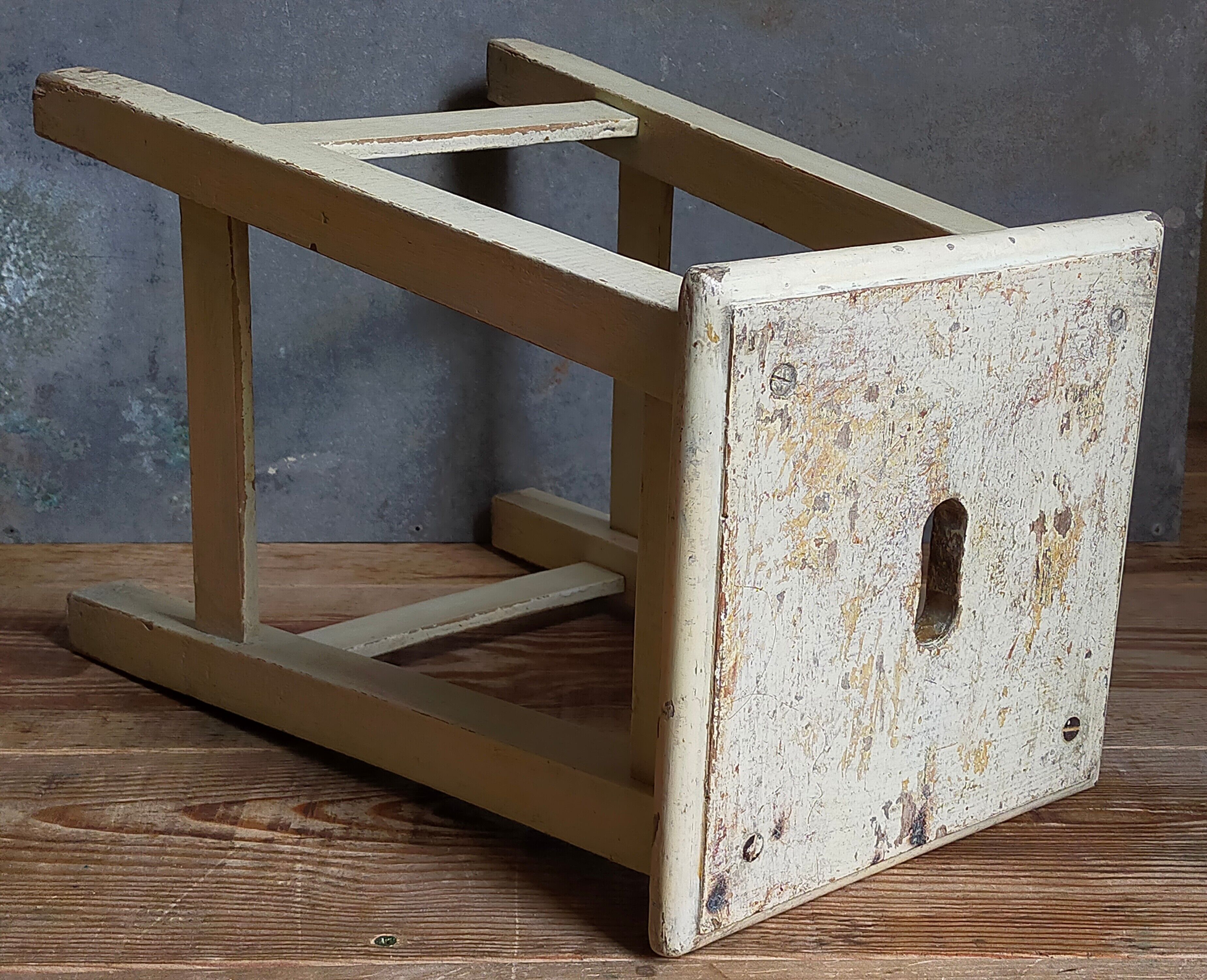 Wooden workshop stool with old patina