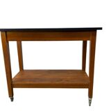 Vintage wooden high table on wheels