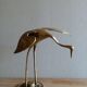 Oiseau prend son envol en laiton