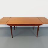 Vintage Scandinavian style dining table from the 50s and 60s in teak with extensions