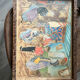 Antique wooden tray depicting a family scene