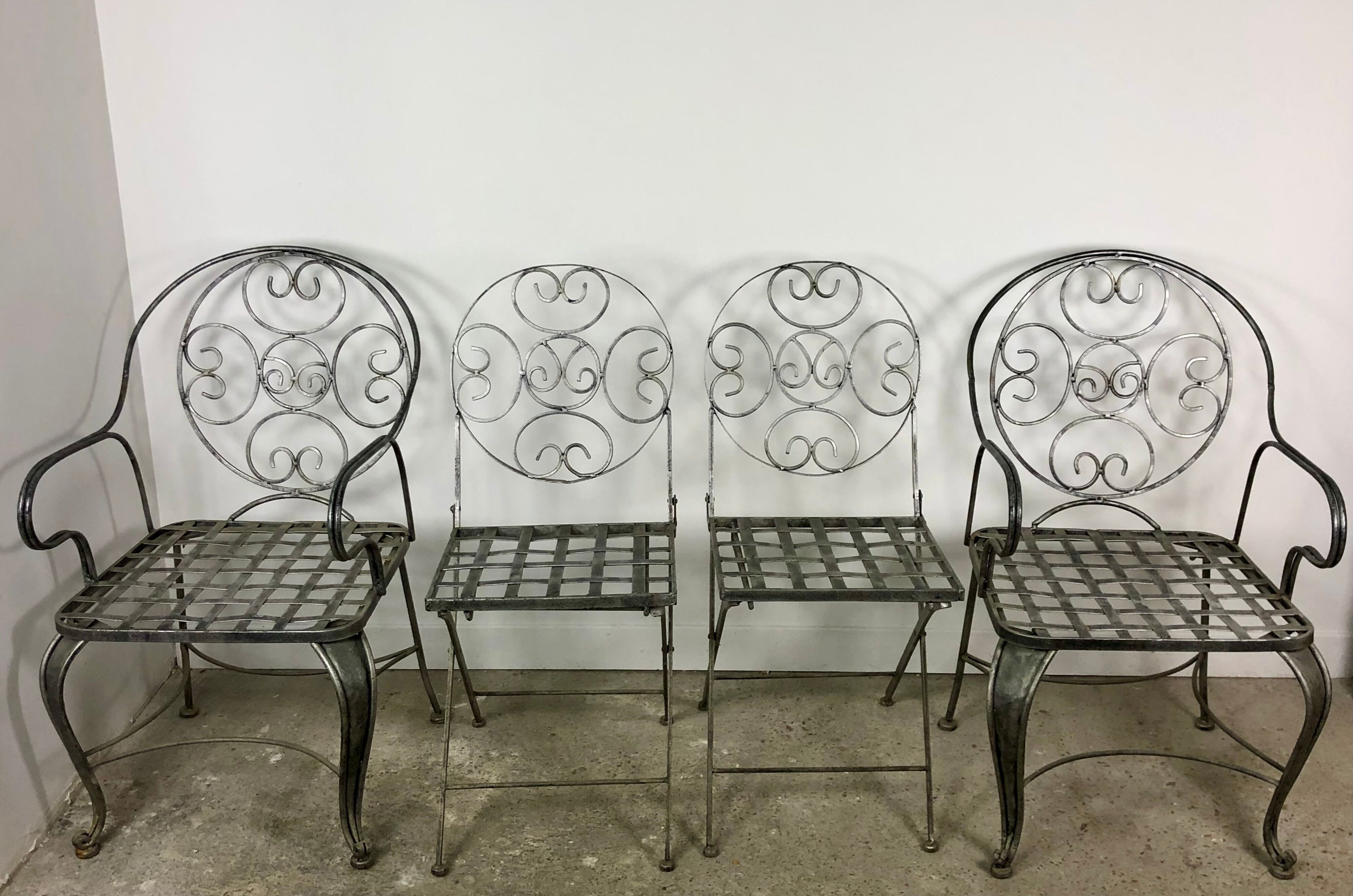Garden chairs and armchairs (series of 4) vintage 1980 in wrought iron