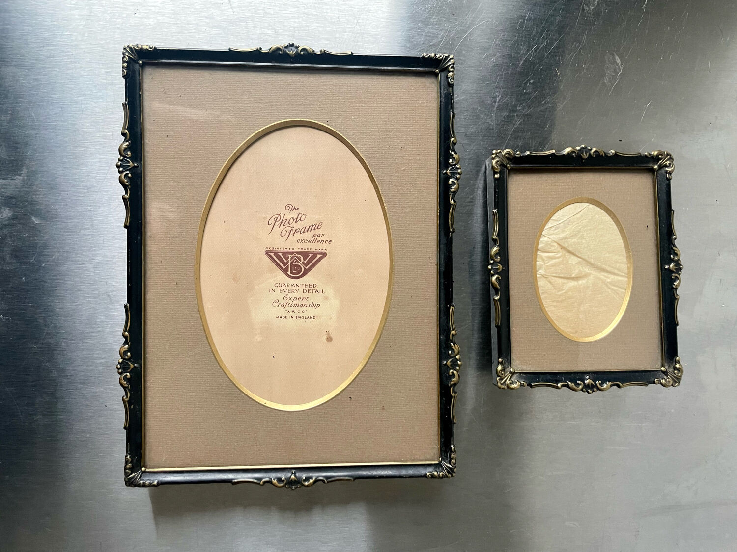 Pair of English Antique Metal Picture Frames in 2 different sizes