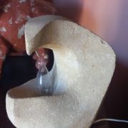 Sculpted stone lamp from the 1970s, signed.