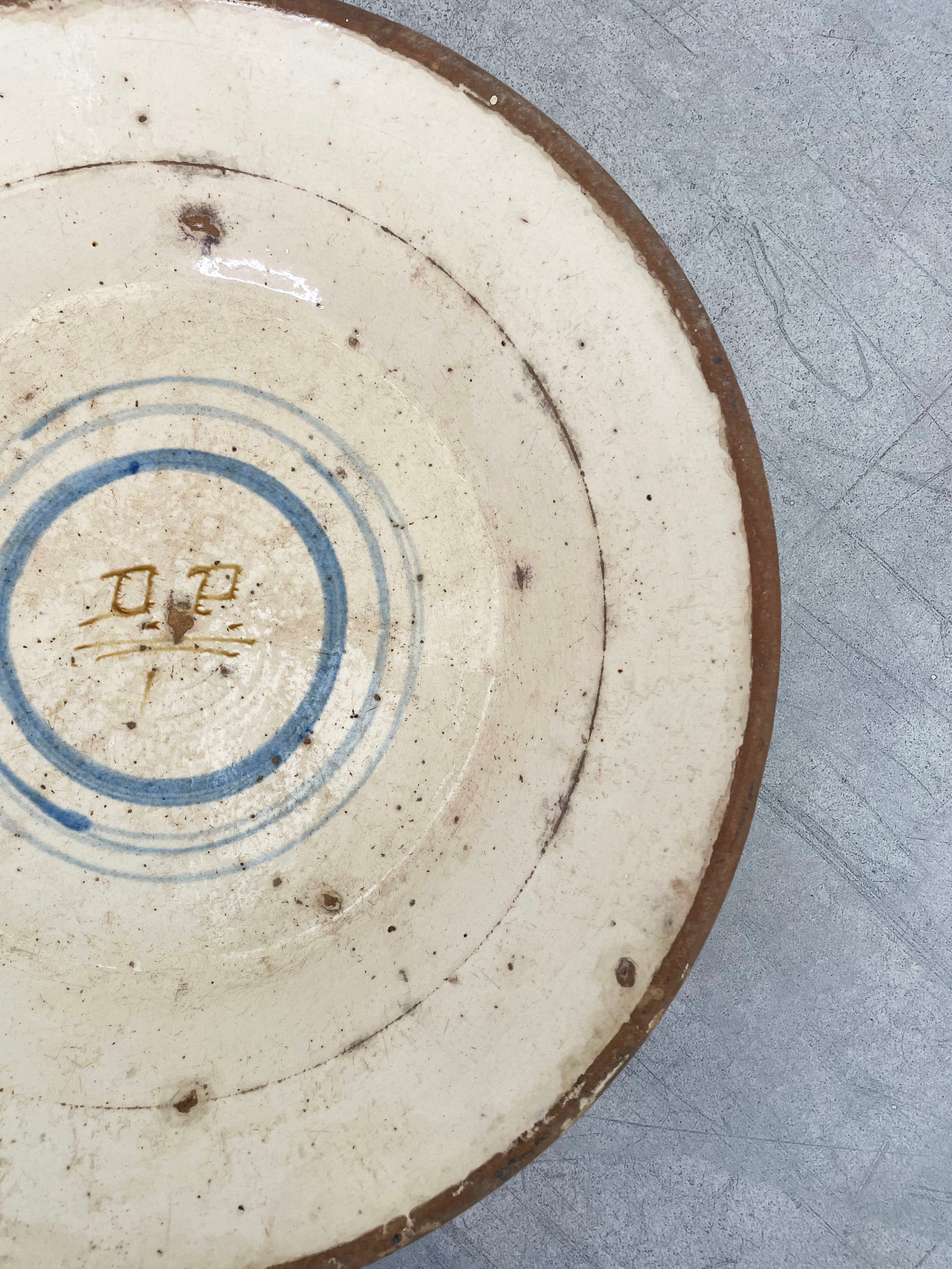 Initialled terracotta bowl