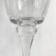 Pair of glass candlesticks on a stand