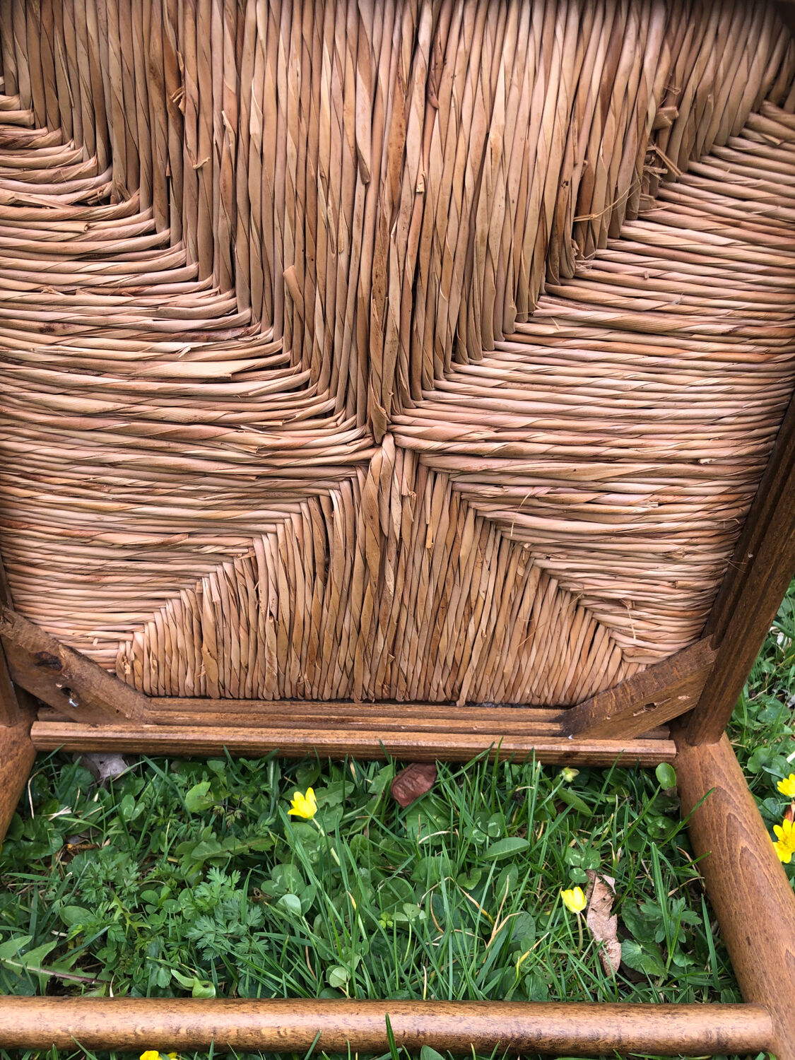 4 wood and straw chairs