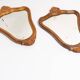 Pair of vintage Mid-Century decorative mirrors in a gold frame, Italy, 1960s.