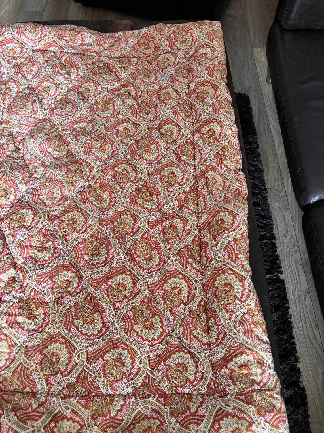 Vintage duvet/bedspread with a paisley pattern.