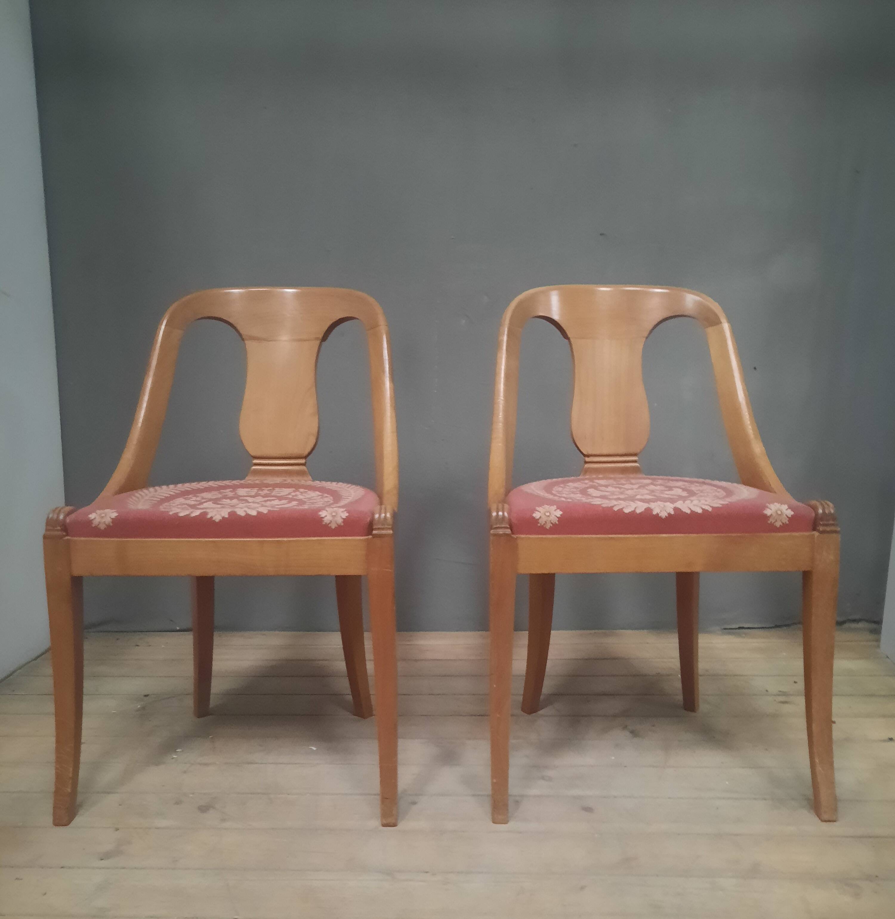 Pair of light wood gondola chairs