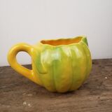 Pitcher in yellow melon slurry